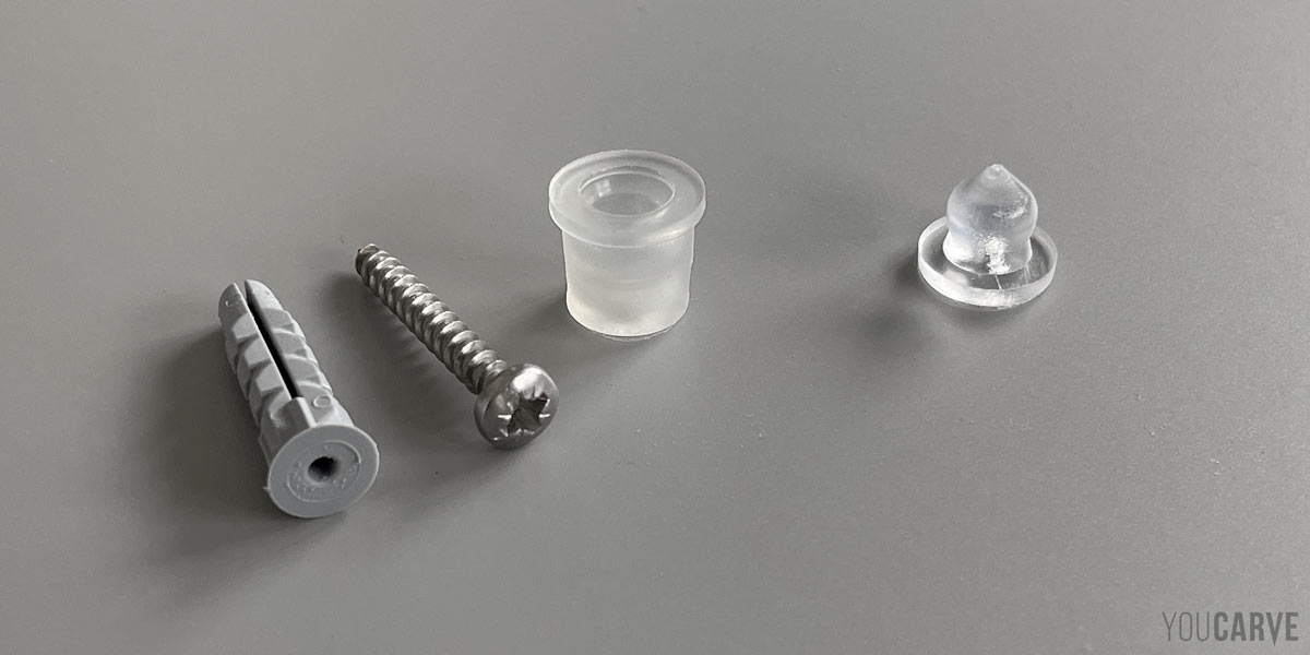 Présentation de la fixation par entretoises clipsables Détail (zoom) sur les pièces composant une fixation entretoise clipsable : cheville polypropylène, vis inox, douille femelle, tenon mâle