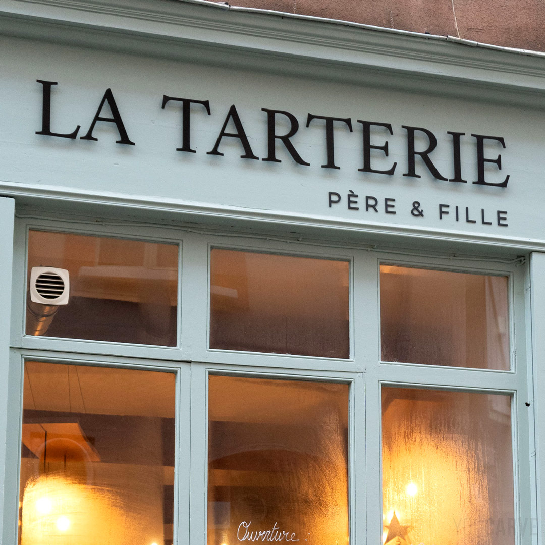 Restaurant sign in Toulouse, raised letters 'La Tarterie' cut in black alu-dibond and fixed on spacers