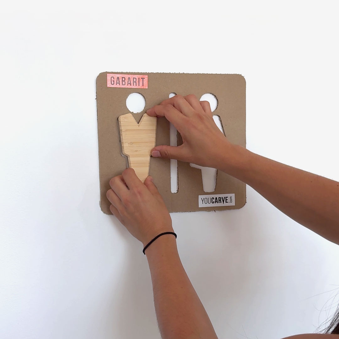 How to install a signage pictogram - Step 3a - Installation/mounting Placing/gluing the pieces of the pictogram